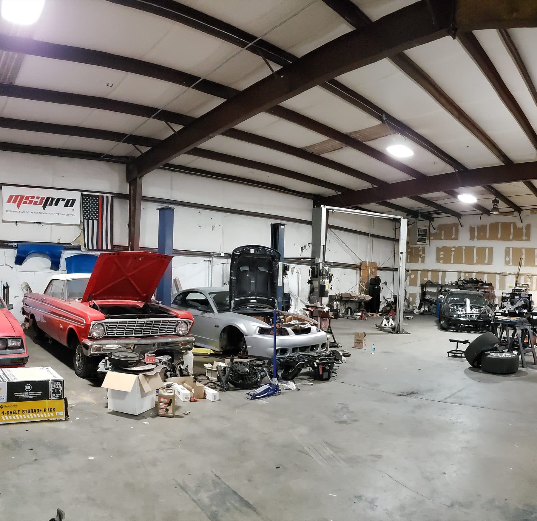 Auto shop after LED upgrade — even high-bay light over the same floor